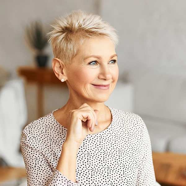 get-good-skin-beautiful-mature-caucasian-woman-with-pixie-hairdo-smiling-with-pleasure