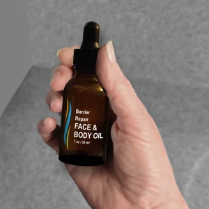 Hand-Holding-1oz-FRAGRANCE-FREE-CORUM-Face-and-Body-oil