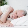 elderly man sleeping peacefully