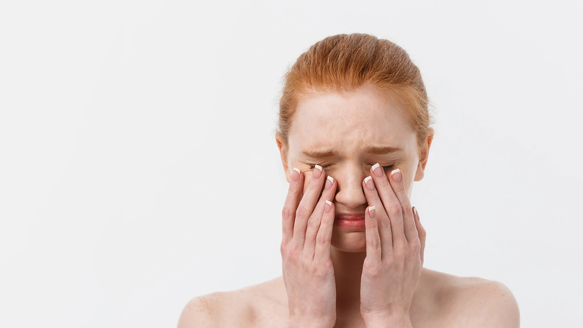 sad-young-woman-holding-face-hands-can-stress-cause-skin-problems